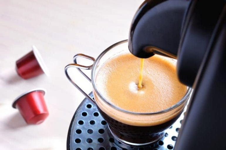 capsule machine serving espresso coffee top view