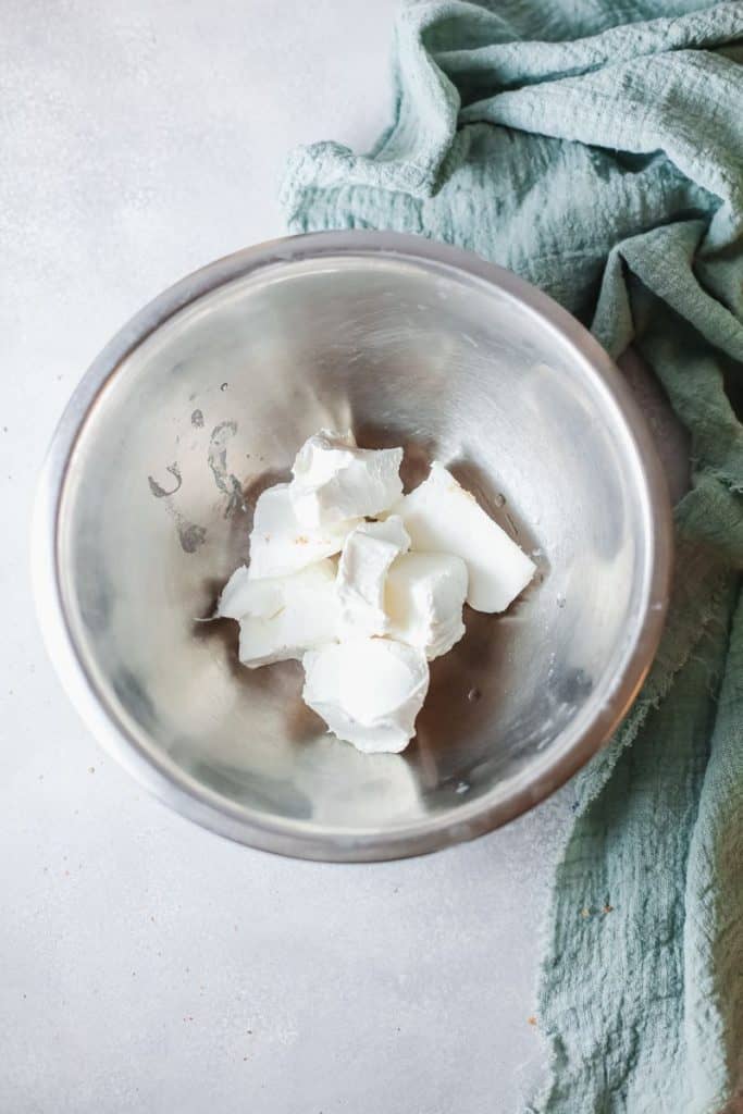 philadelphia cheese in bowl for baked cheesecake with coffee