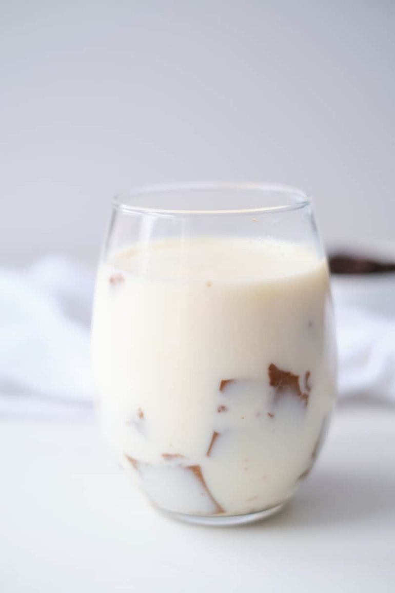 coffee jello in glass of milk.