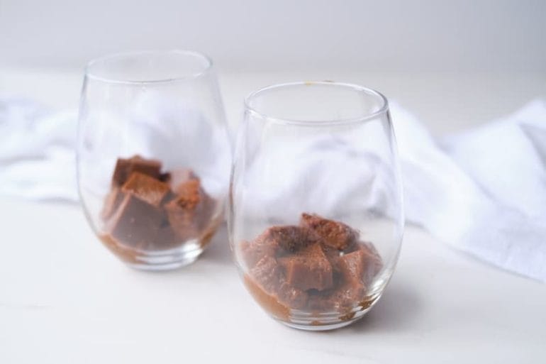 2 glasses with cubes of coffee jello.
