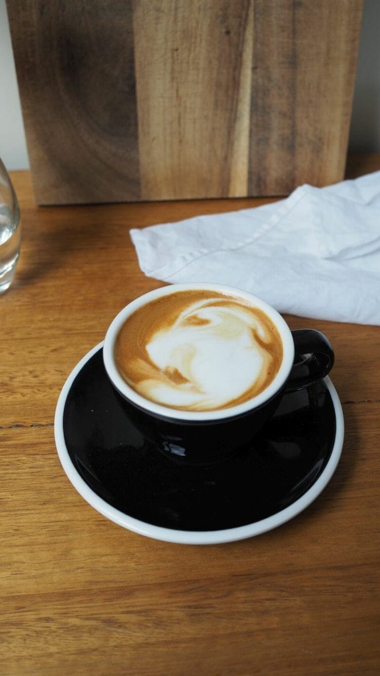 Latte art on double ristretto flat white aka melbourne magic coffee.