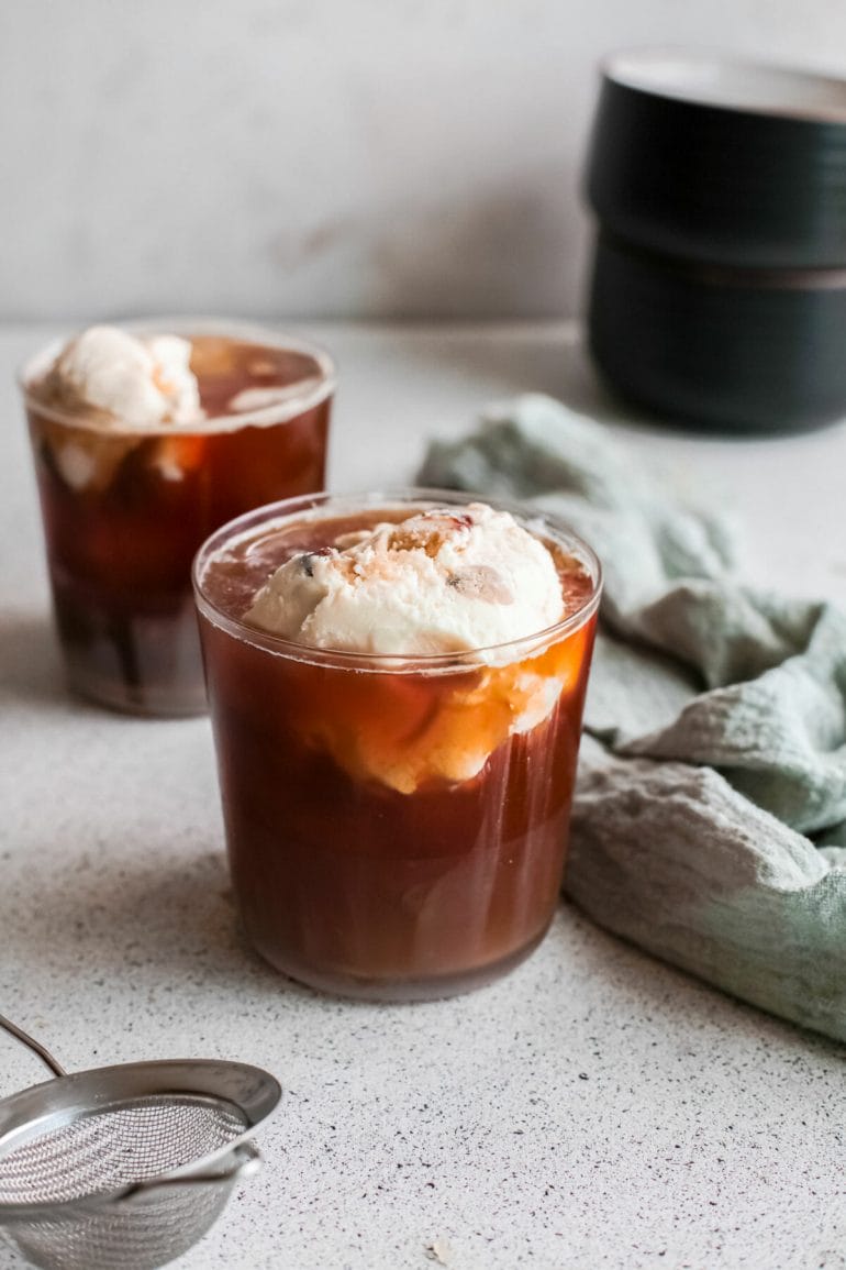 cold brew coffee float with ice cream in glass.