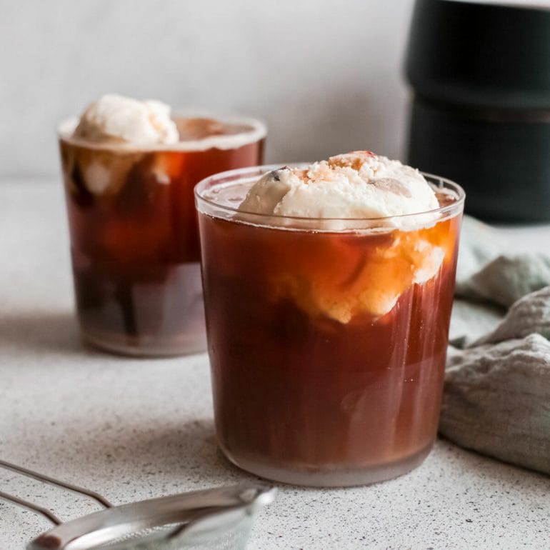 cold brew float with ice cream in a glass.