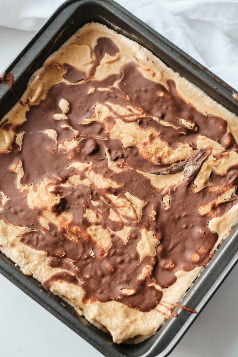 Process shot showing how to make ice cream with nutella and coffee.